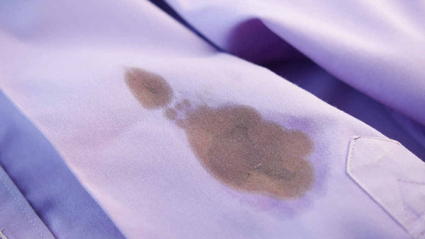 how do you get oil out of clothes